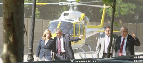 Streets blocked by Barcelonas indignation, the politicians have to be flown in to make cuts... Remember Argentina??? 