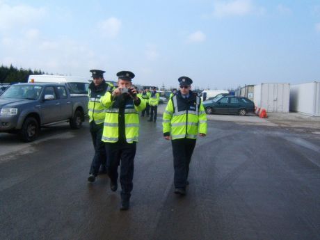 Shell's cops: watching them watching us. 