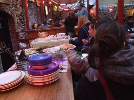 Women helping themselves to the Community Meal, Fionbarra's