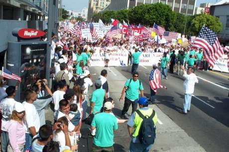 March stretches back past Hancock Bldg., back to McArthur park