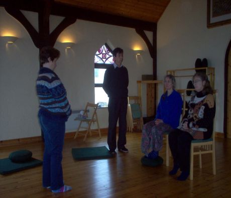 Click on image to see full-sized version Often, chairs and other objects are brought in as props or support.