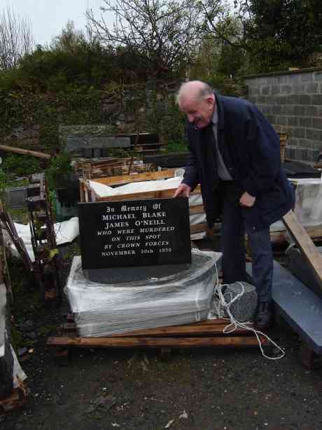 Organising committee chairman Des Longs views the new memorial