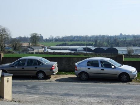 Brown area at rear - Castletown site - top of the hill behind