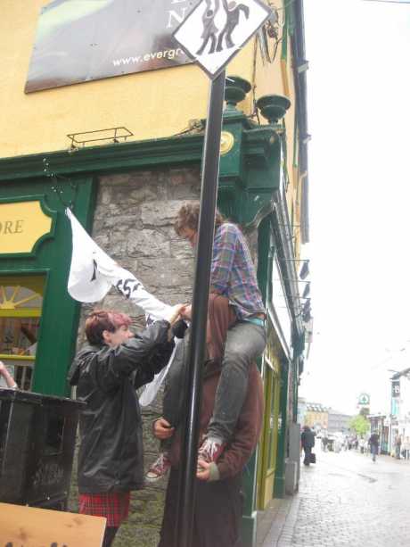 hoisting banners- after quite awhile evergreen asked us to remove them, but they were up for most of the day.