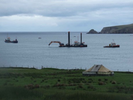 Jack-up barge being towed into place