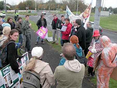 Click on image to see full-sized version 23 gather in Lidl carpark and prepare to march to Shannon Warport