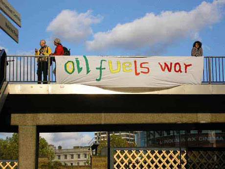 Click on image to see full-sized version Message on the overpass outside Shell HQ