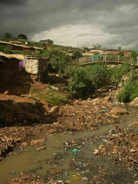 land of death, river of shit; the only place to drink from for those with no money - photos c/o Jo French's website tumbalamwezi