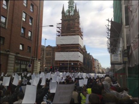 Families hold portraits high as RIR/UDR 'parade' past