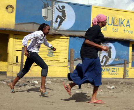 Esther (in heels) and Leyla chasing an errant husband in a soon to be released production