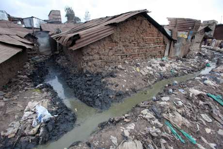 Open sewer running around a home in Mathare.