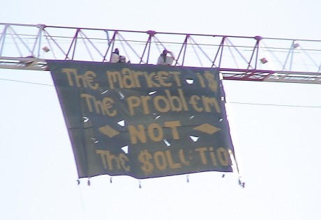 Click on image to see full-sized version "Markets are the problem, not the solution" Banner drop at closing day of Barcelona climate talks