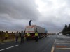 Standing on the Peat truck outside the refinery