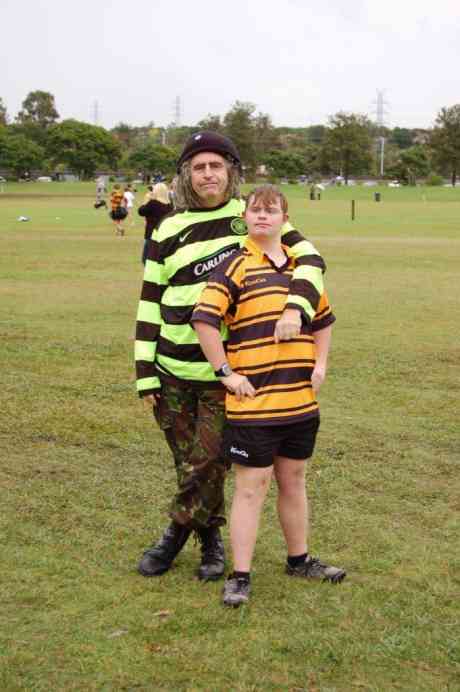 Ciaron O'Reilly and godson Sean Fisher at half time St Laurence's, Brisbane, Australia