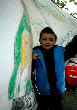 Young Master MacGregor Makes A Tent From A Banner