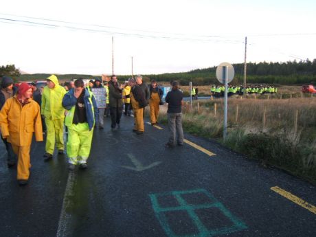 Click on image to see full-sized version Protesters regroup and walk down towards the Bellanaboy Bridge.