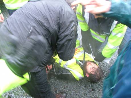 Garda unlawfully detain and assault local resident