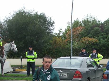 Asst Commissioner & Supt J. Kerins look on.