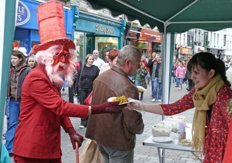 Nose-bag time for Kieran Davies, Galway's noted street artist, musician and playwright.