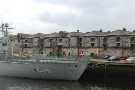 Photo shows helicopter hangar and landing pad at ship's stern