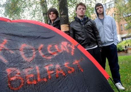 #OccupyBelfast: Anti-capitalist protestors brave Ulster rain (William Donnelly, Ryan Barnes and Neil Moore, as Occupy Belfast demonstrators Protest at the Cathedral quarter in Belfast)