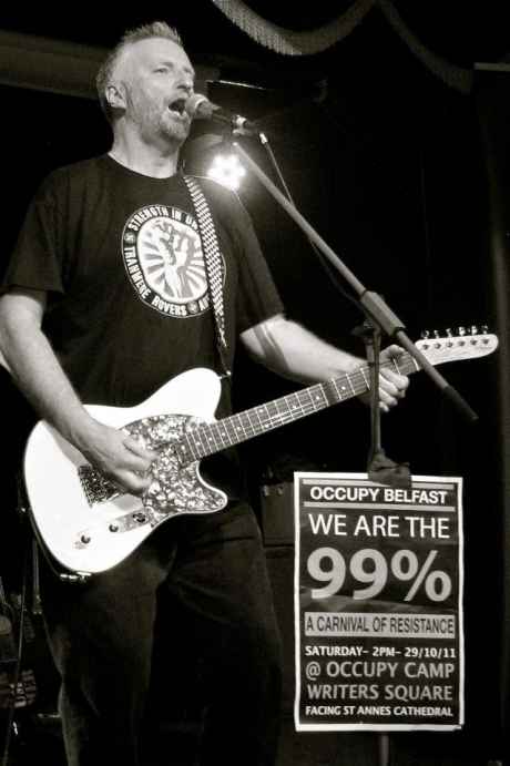 Billy Bragg gig in Belfast: an onstage row with the organisers over the displaying of a poster for a coming Occupy Belfast event