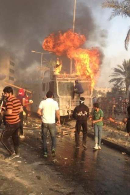 more_bahrain_youth_burning_police_van_oct05_2012.jpg