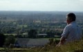 Tourist enjoys view of 16 counties from the Hill of Tara