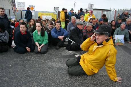 Click on image to see full-sized version Sit-down outside the gates