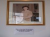 portrait in consulate with added caption