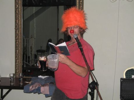 Tom Cambell performing a poem about drink