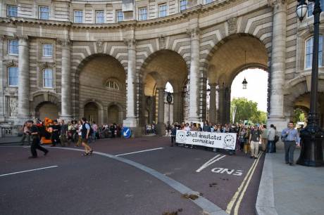 The procession comes through Admiralty Arch as the message is taken across London. Even the Mall was closed for them.