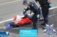 ausi_cops_help_70yr_woman_by_pepper_spraying.jpg